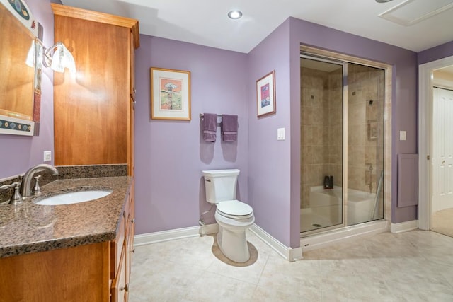 bathroom with baseboards, toilet, a stall shower, tile patterned floors, and vanity