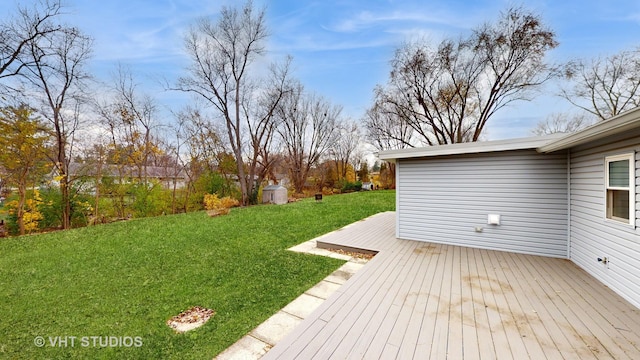 view of yard featuring a wooden deck