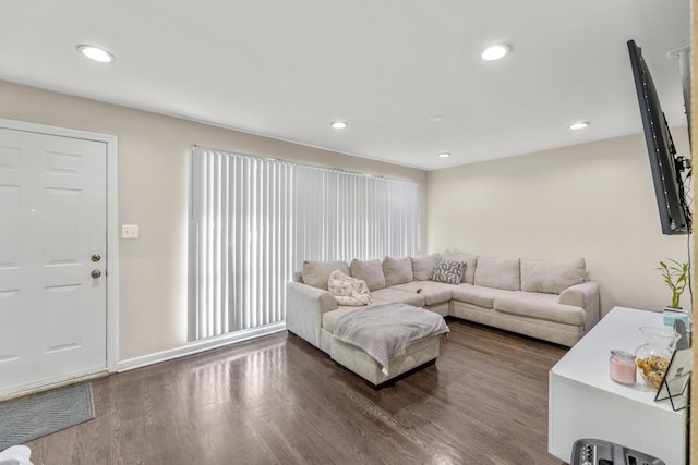 living room with recessed lighting and wood finished floors