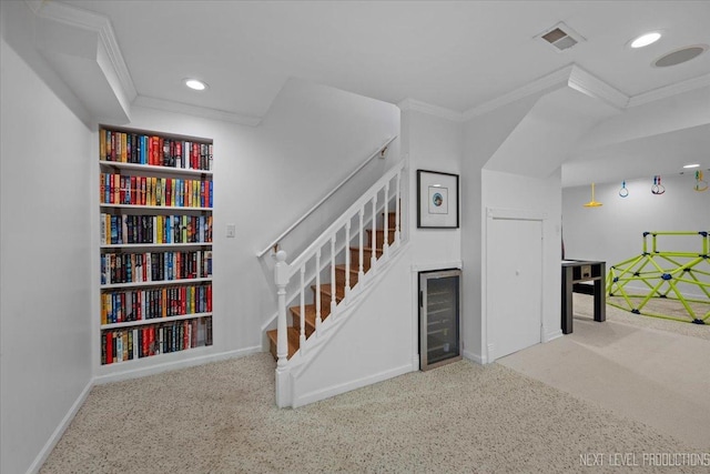 stairs featuring recessed lighting, baseboards, carpet, and ornamental molding