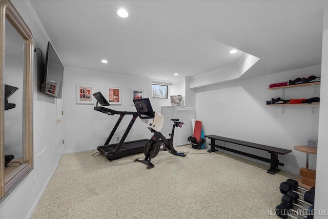 exercise area with recessed lighting, baseboards, and crown molding