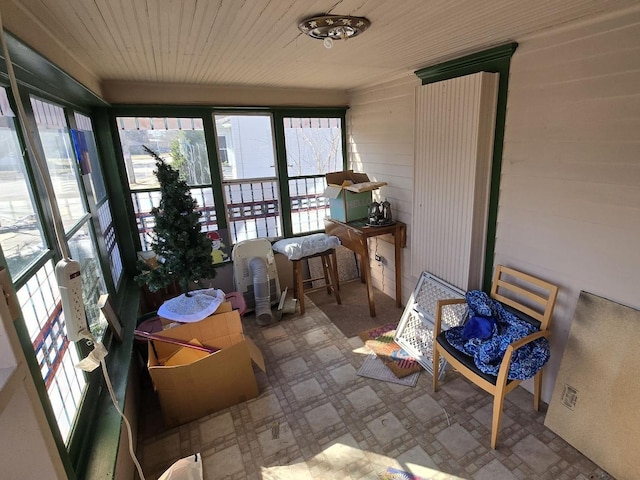 sunroom with wood ceiling