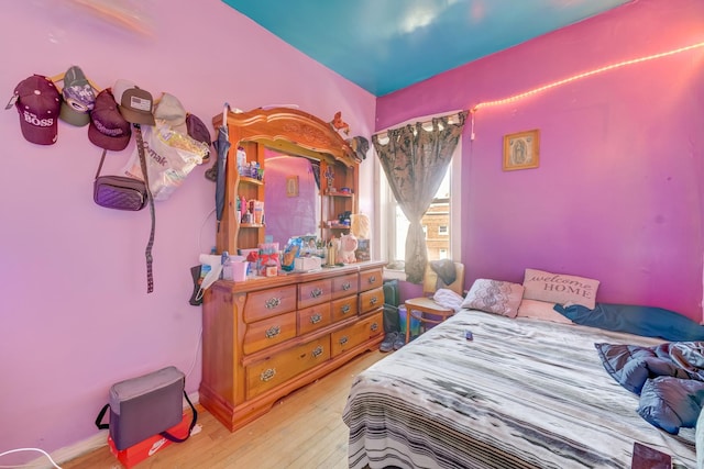 bedroom featuring hardwood / wood-style floors