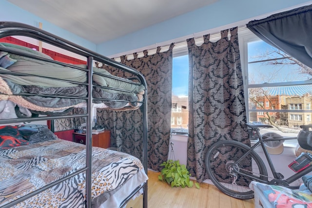 bedroom featuring wood finished floors