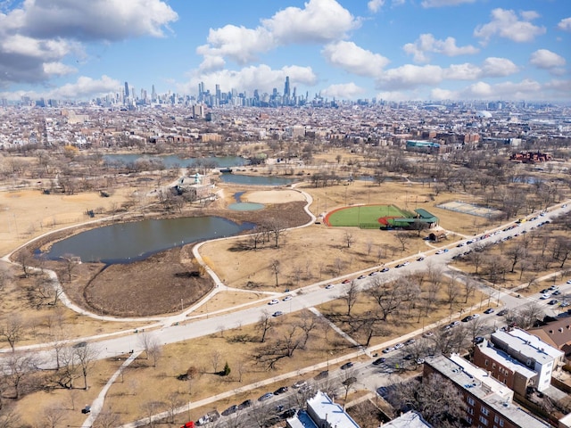 bird's eye view with a view of city and a water view