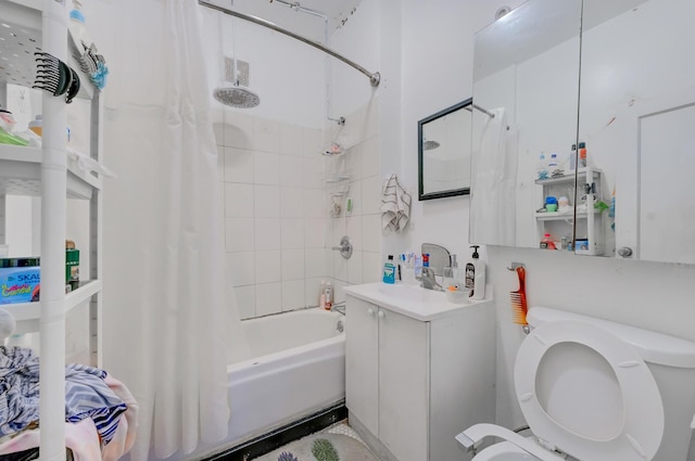 bathroom with vanity, toilet, and shower / bath combo with shower curtain