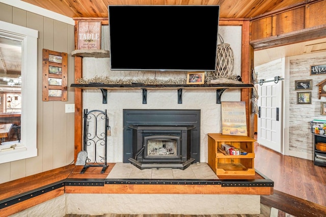 interior details with wood walls and wooden ceiling