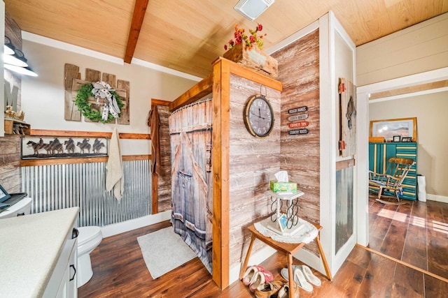 bathroom featuring wooden ceiling, toilet, and hardwood / wood-style floors