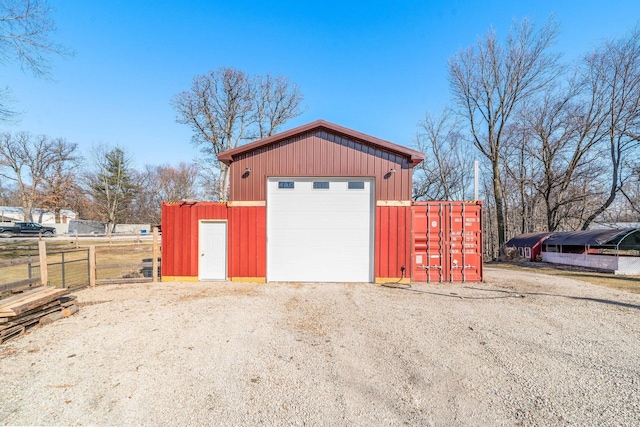 exterior space featuring fence and driveway