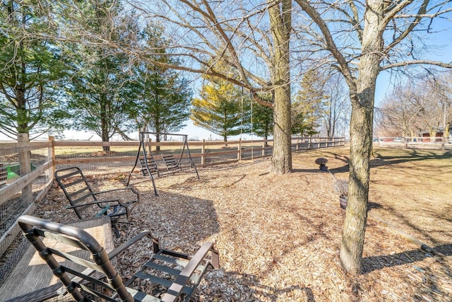 view of yard featuring fence