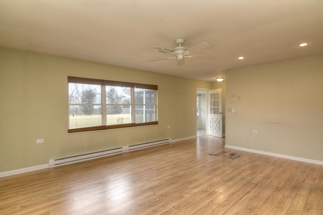 spare room with recessed lighting, light wood finished floors, baseboards, baseboard heating, and ceiling fan