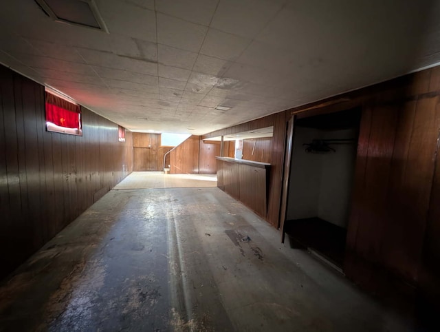 finished basement with wooden walls