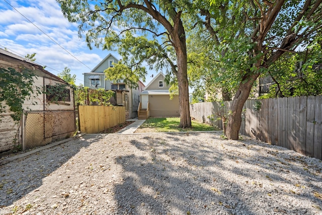 view of yard featuring fence private yard and a gate