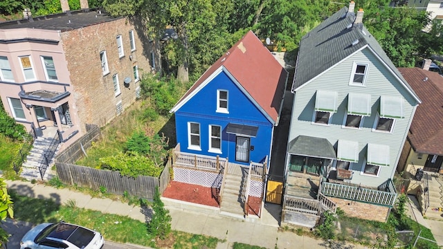 view of front of house featuring a fenced front yard and a gate