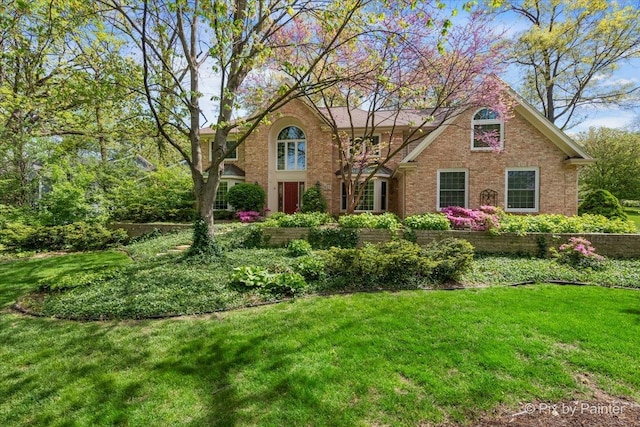 1023 Trillium Trl, West Chicago, IL 60185 - view of front of home featuring brick siding and a front lawn
