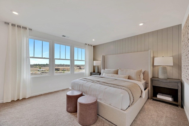 bedroom with carpet flooring, recessed lighting, visible vents, and baseboards