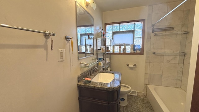 bathroom with vanity, toilet, baseboards, and visible vents