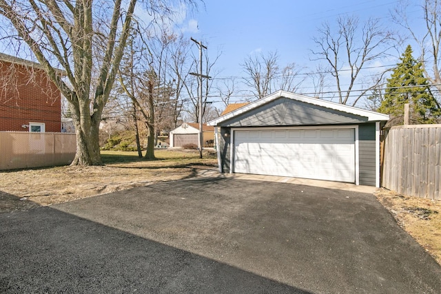 detached garage with fence