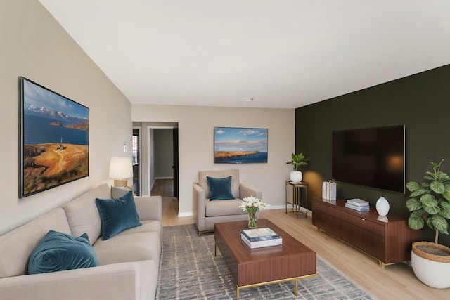 living area featuring wood finished floors and baseboards