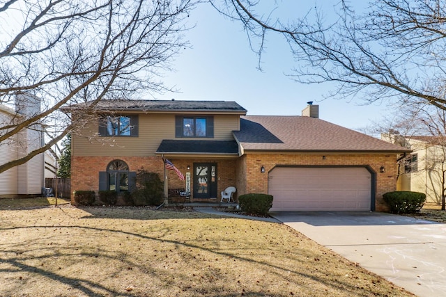 traditional-style house with brick siding, roof with shingles, a chimney, a garage, and driveway