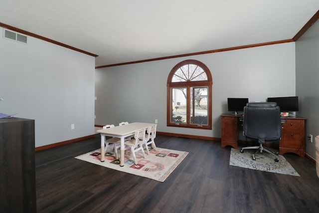 office space with ornamental molding, wood finished floors, visible vents, and baseboards