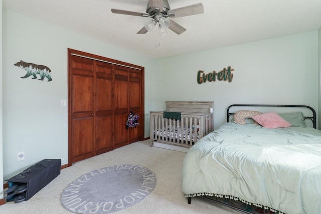 bedroom with a closet, carpet floors, and ceiling fan