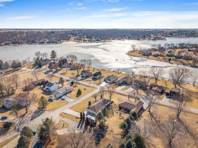 birds eye view of property featuring a residential view and a water view