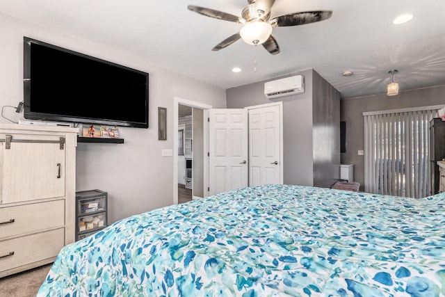 carpeted bedroom with ceiling fan, recessed lighting, and a wall mounted AC