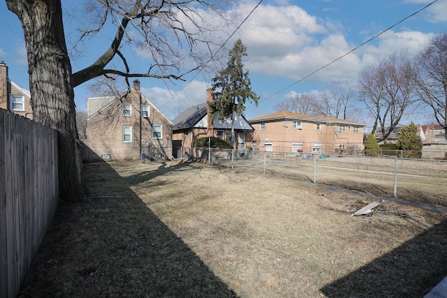 view of yard featuring a fenced backyard