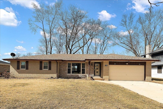 ranch-style house featuring a front yard, brick siding, a garage, and driveway