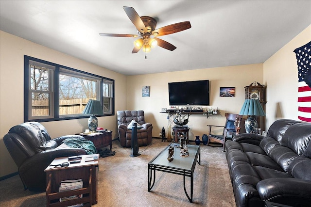 living room with carpet and ceiling fan