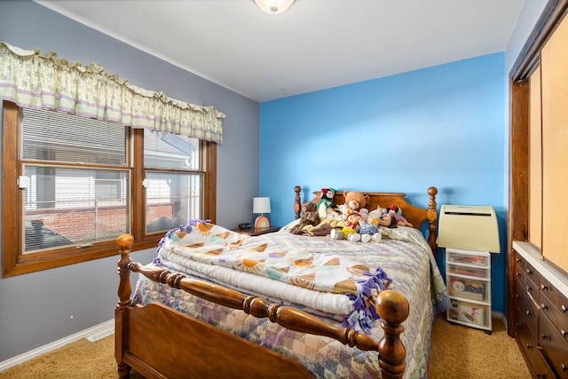 bedroom featuring visible vents, baseboards, and carpet