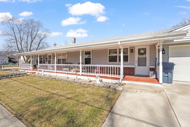 single story home featuring a garage, a porch, and a front lawn