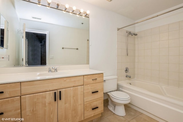 bathroom featuring shower / bath combination, toilet, visible vents, tile patterned floors, and vanity