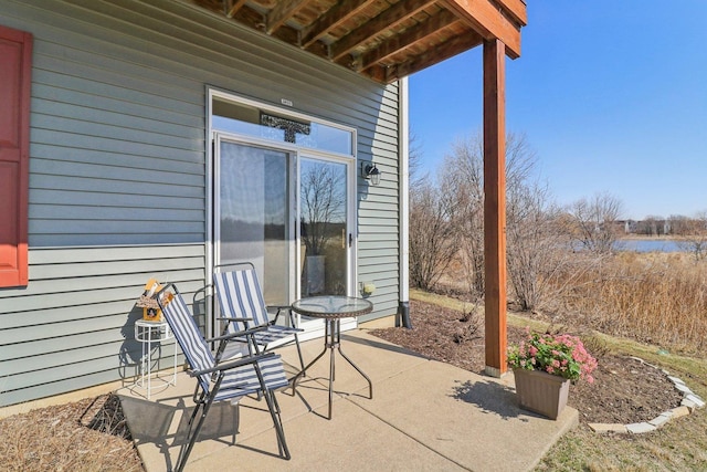 view of patio / terrace with a water view