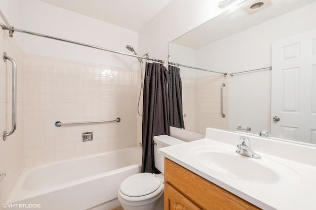 bathroom with vanity, toilet, and shower / tub combo with curtain