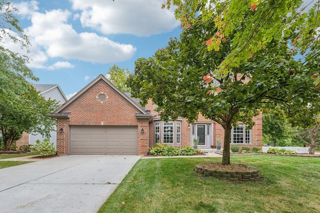 view of front of home featuring concrete driveway, an attached garage, brick siding, and a front yard