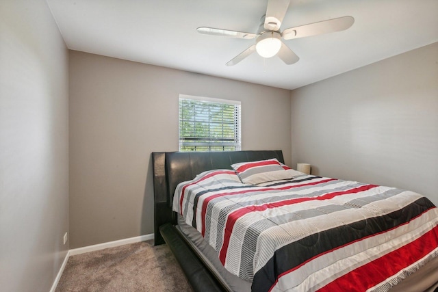 bedroom with baseboards, a ceiling fan, and carpet flooring