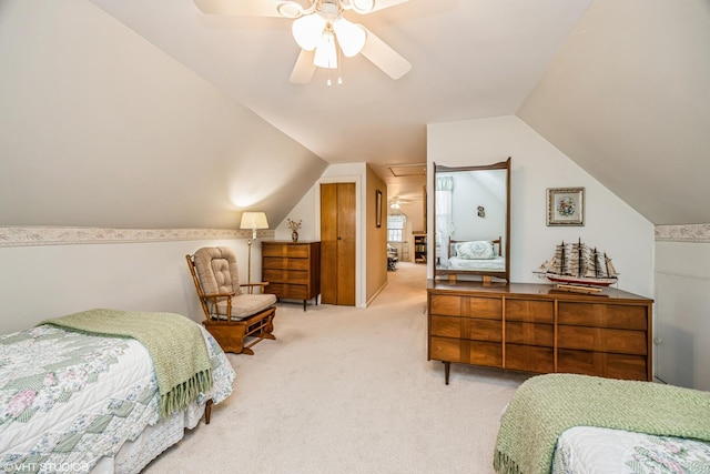 bedroom featuring light colored carpet, a ceiling fan, and lofted ceiling