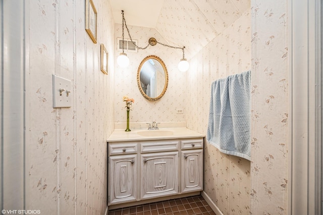 bathroom featuring wallpapered walls, vanity, and tile patterned flooring