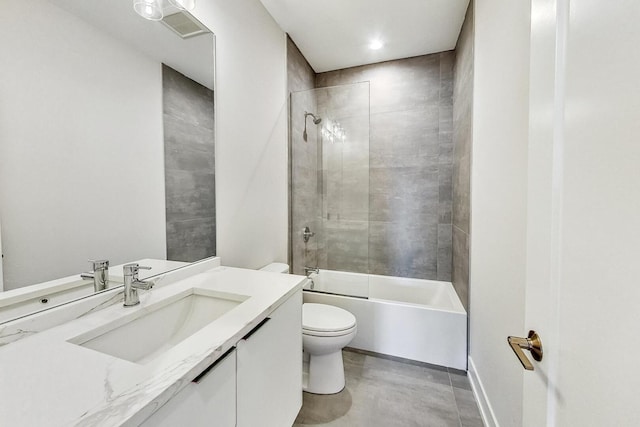 bathroom with tub / shower combination, toilet, and vanity