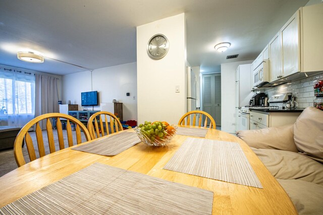 dining space with visible vents