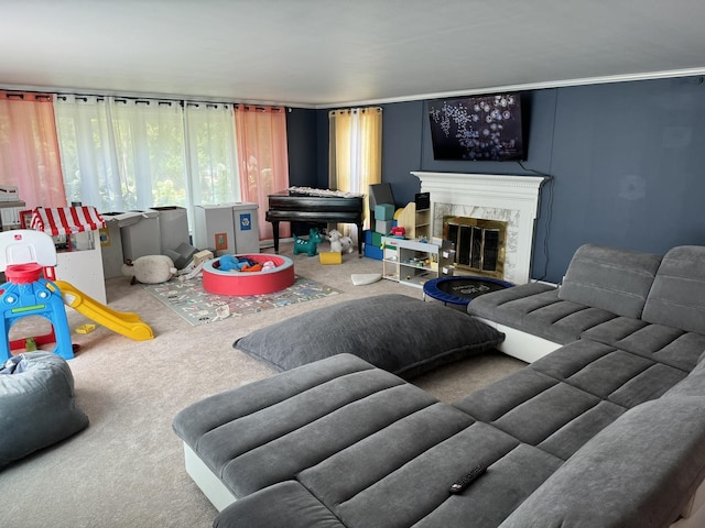 carpeted living room featuring a high end fireplace