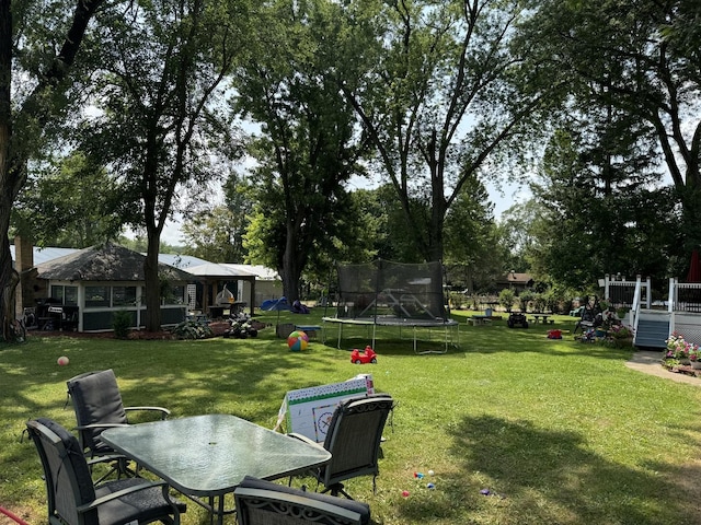 view of yard featuring a trampoline