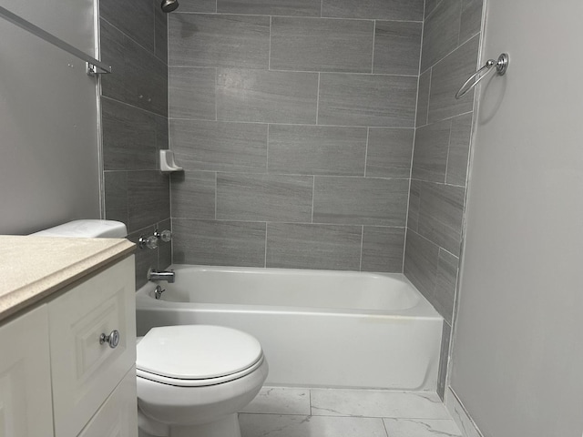 full bath with tub / shower combination, toilet, marble finish floor, and vanity