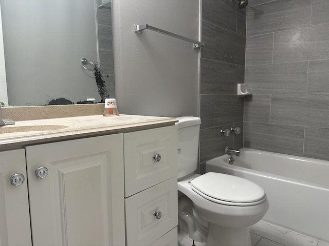 bathroom with tub / shower combination, toilet, and vanity