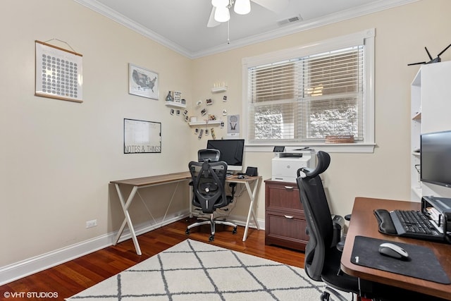 office featuring wood finished floors, baseboards, visible vents, ceiling fan, and crown molding