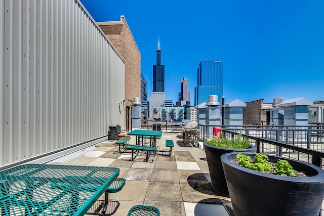 view of patio featuring a view of city