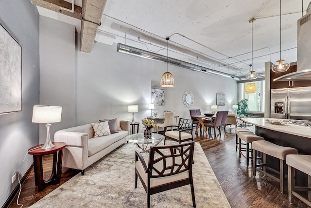 living area featuring dark wood-style floors