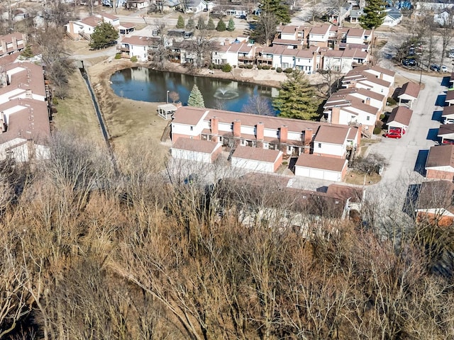 birds eye view of property featuring a residential view and a water view